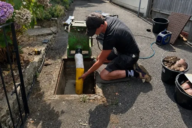 No-dig CIPP resin lining being installed inside a damaged drain pipe.